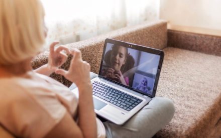 woman on video conference with child
