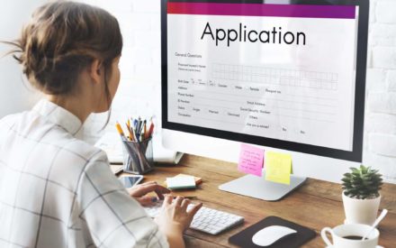 female completing online application