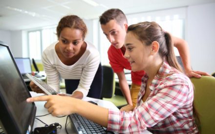 group of students working at a computer