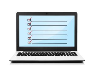 computer with checklist